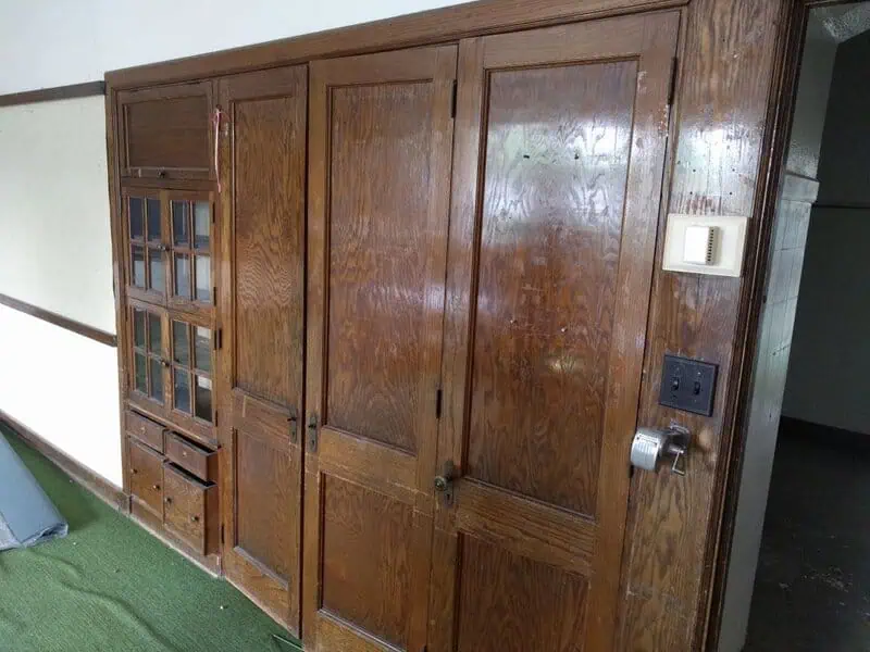 Built-in wall cabinet system restored from McKinley School.