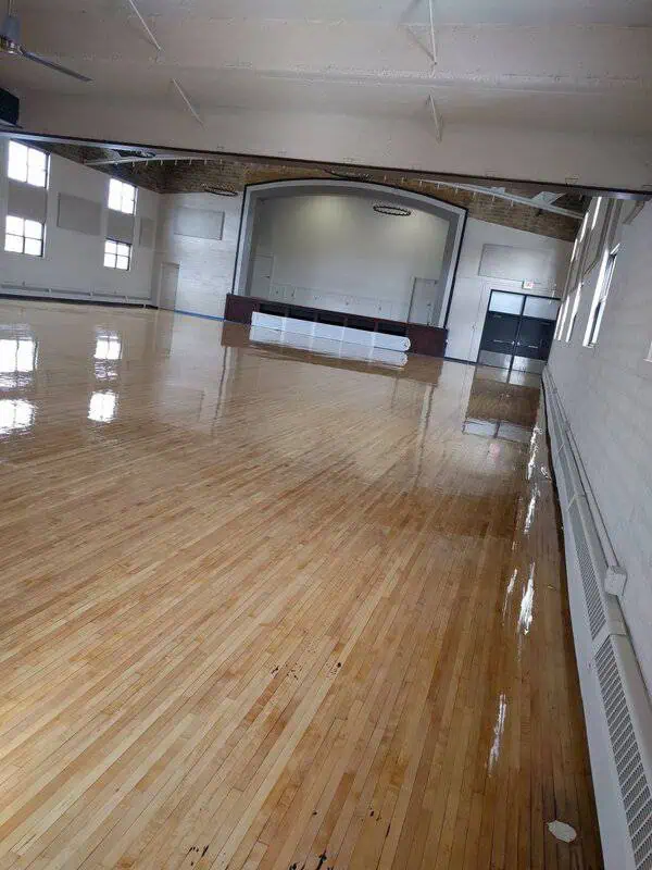 Wood floor restoration at the Adrian Armory.